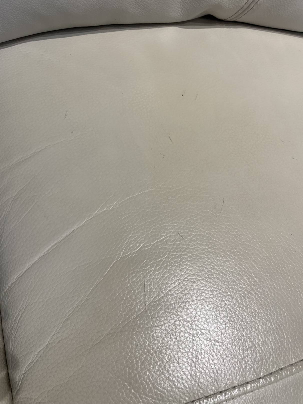 Crosslin leather power store reclining loveseat