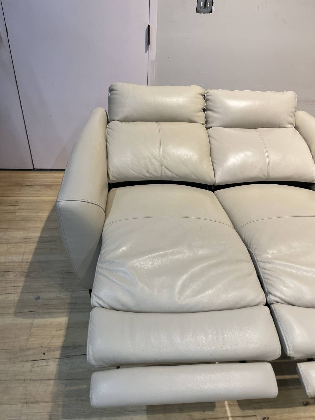Crosslin Leather Power Reclining Loveseat with Power Headrests