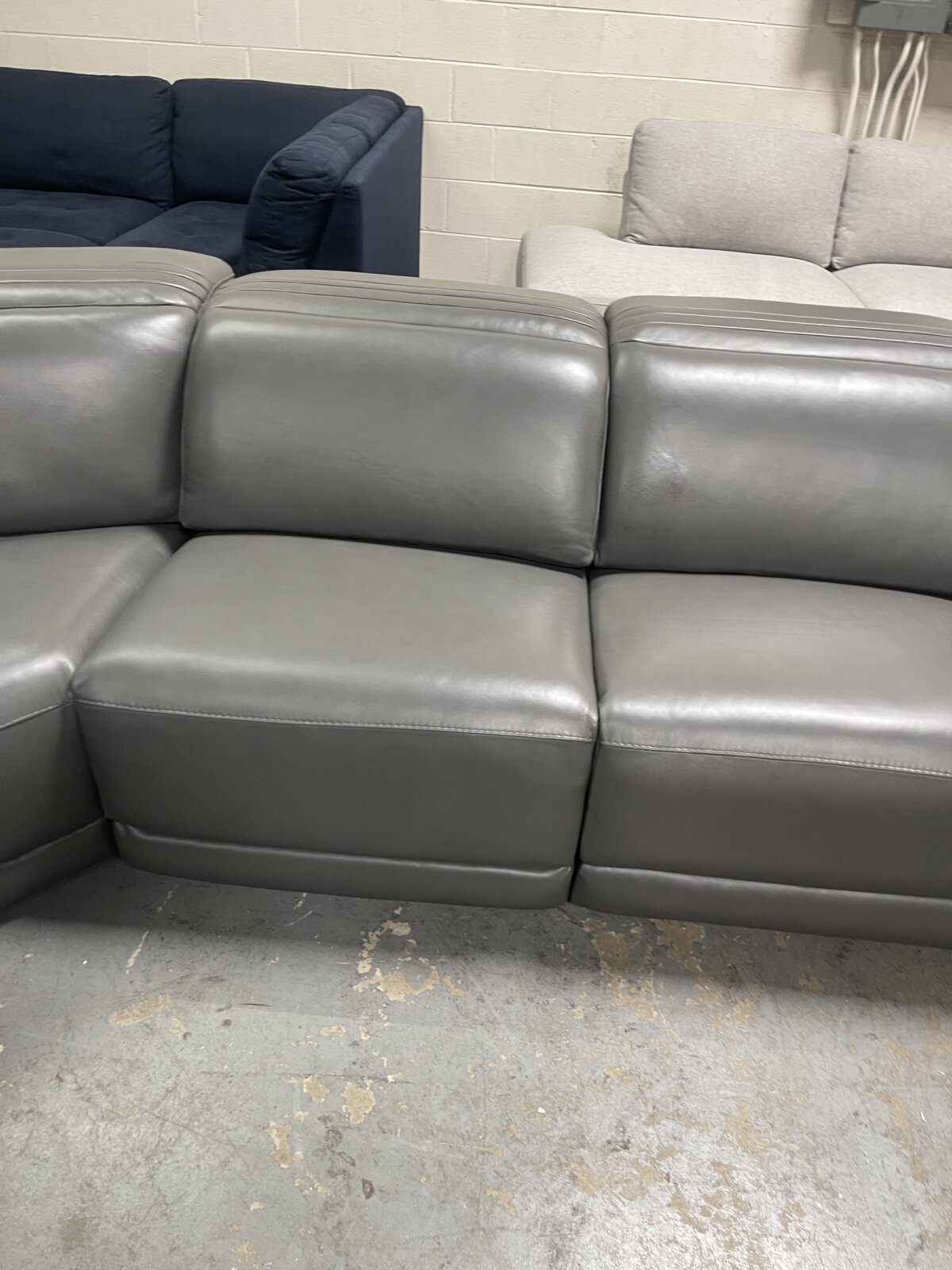 Karson Leather Power Reclining Sectional With Power Headrests - Image 6